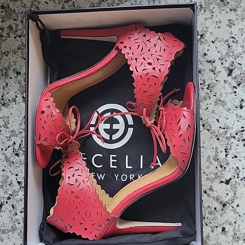 Gorgeous pair of red lasercut Cecelia heels US sz 9.5